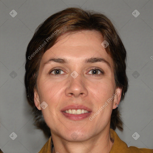 Joyful white adult female with medium  brown hair and brown eyes