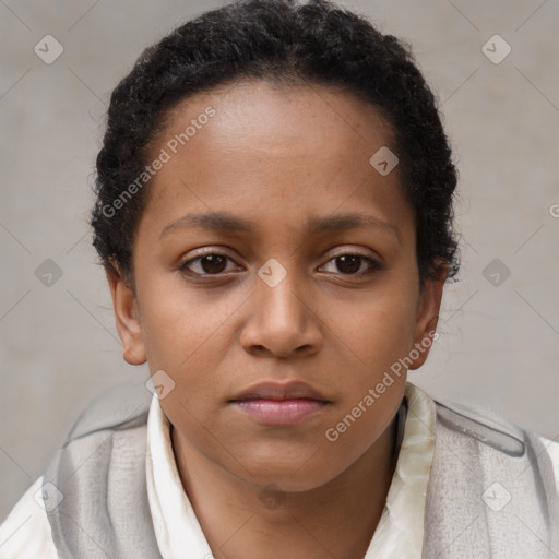 Neutral black young-adult female with short  brown hair and brown eyes