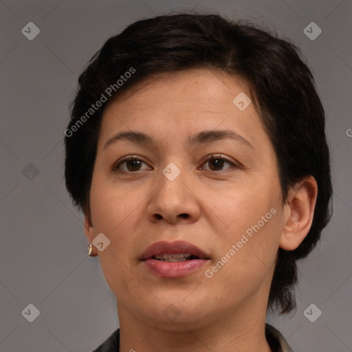 Joyful white adult female with medium  brown hair and brown eyes