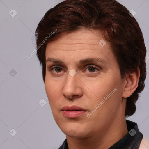 Joyful white adult female with medium  brown hair and brown eyes