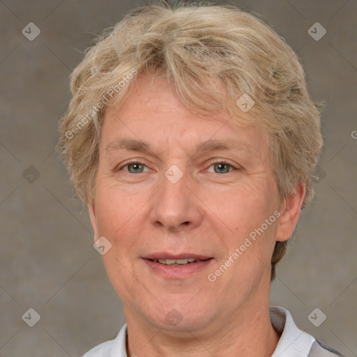 Joyful white middle-aged male with short  brown hair and brown eyes