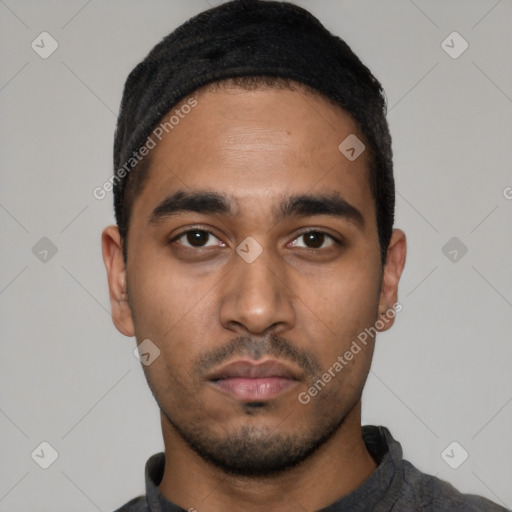Neutral latino young-adult male with short  black hair and brown eyes
