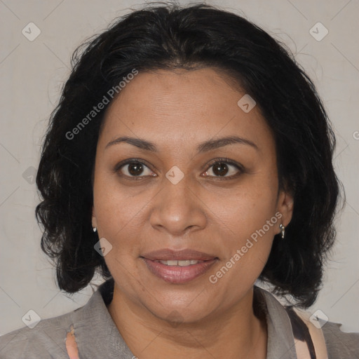 Joyful black adult female with medium  brown hair and brown eyes