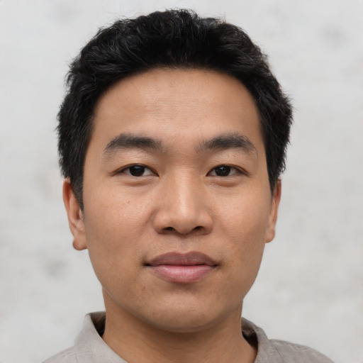Neutral asian young-adult male with short  black hair and brown eyes