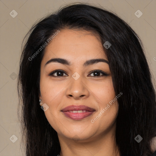 Joyful latino young-adult female with long  black hair and brown eyes