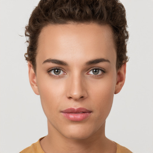 Neutral white young-adult female with short  brown hair and brown eyes