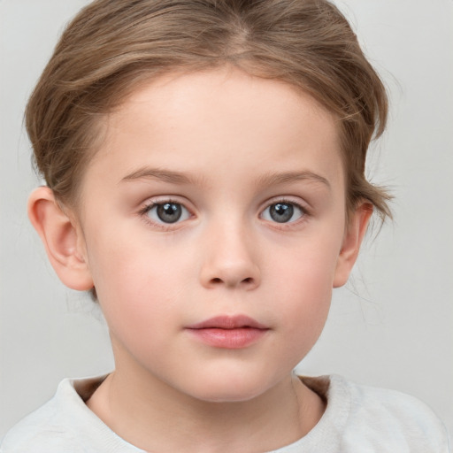 Neutral white child female with medium  brown hair and blue eyes