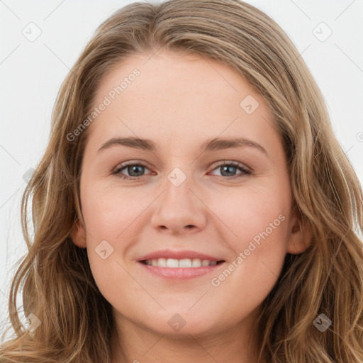 Joyful white young-adult female with long  brown hair and green eyes