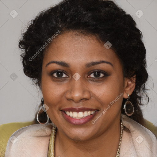 Joyful black young-adult female with long  brown hair and brown eyes