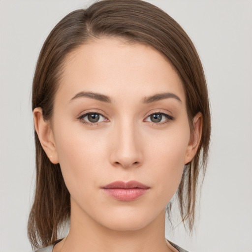 Neutral white young-adult female with medium  brown hair and brown eyes