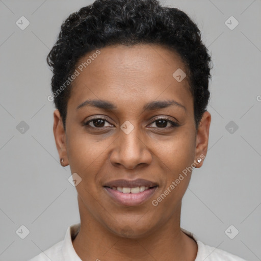 Joyful black young-adult female with short  black hair and brown eyes