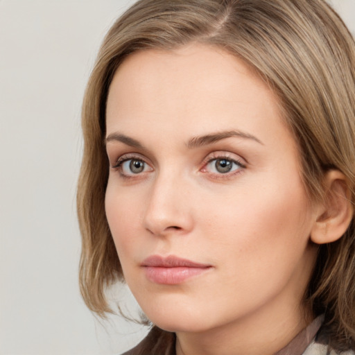 Neutral white young-adult female with long  brown hair and grey eyes