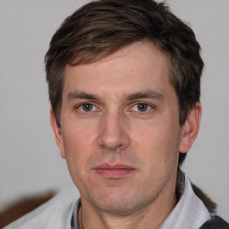 Neutral white adult male with short  brown hair and brown eyes