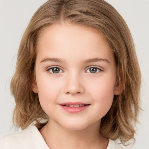 Joyful white child female with medium  brown hair and brown eyes