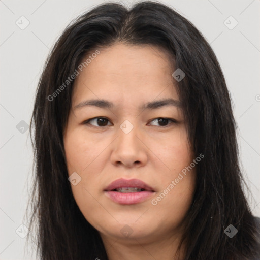 Joyful asian young-adult female with long  brown hair and brown eyes