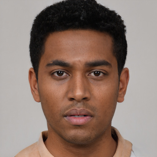 Neutral black young-adult male with short  black hair and brown eyes