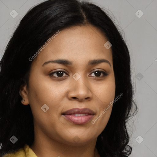 Joyful latino young-adult female with long  brown hair and brown eyes