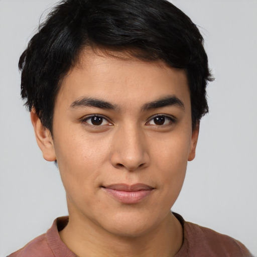 Joyful asian young-adult male with short  brown hair and brown eyes