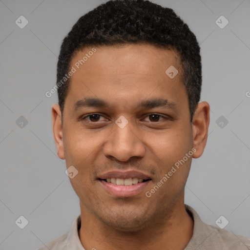 Joyful latino young-adult male with short  brown hair and brown eyes