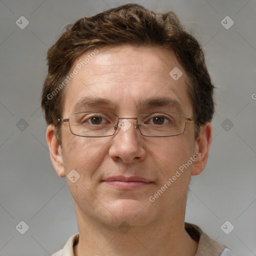 Joyful white adult male with short  brown hair and brown eyes