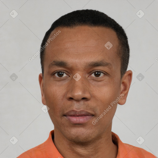 Neutral black young-adult male with short  black hair and brown eyes