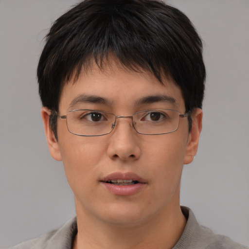 Neutral asian young-adult male with short  brown hair and brown eyes