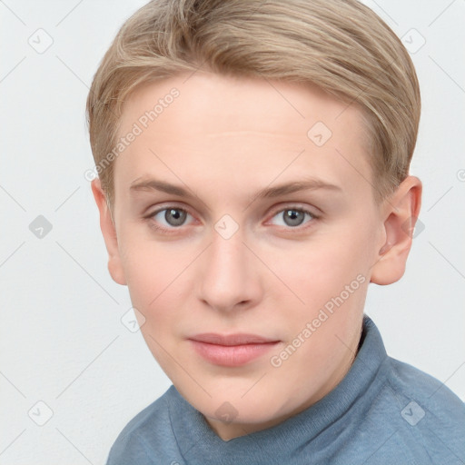 Joyful white young-adult female with short  brown hair and blue eyes