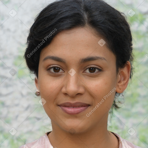 Joyful latino young-adult female with short  brown hair and brown eyes