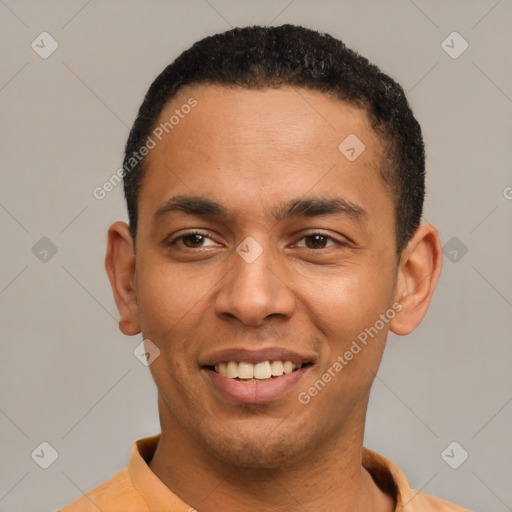 Joyful latino young-adult male with short  black hair and brown eyes