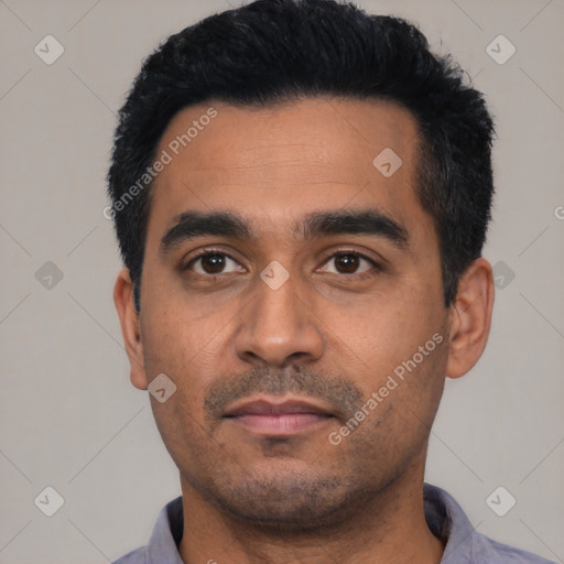 Neutral latino young-adult male with short  black hair and brown eyes