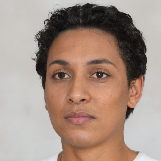Neutral latino young-adult female with short  black hair and brown eyes