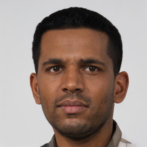 Neutral black young-adult male with short  black hair and brown eyes