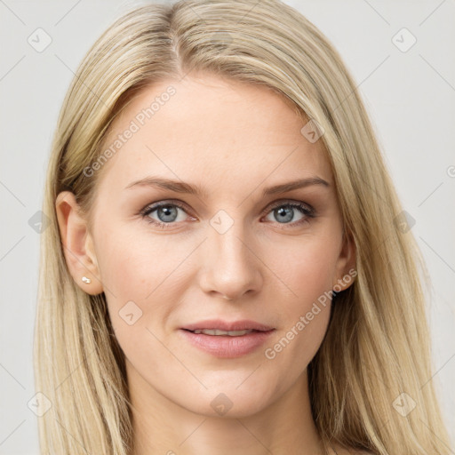 Joyful white young-adult female with long  brown hair and blue eyes