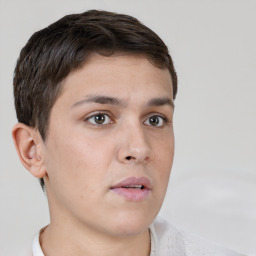 Neutral white young-adult male with short  brown hair and brown eyes