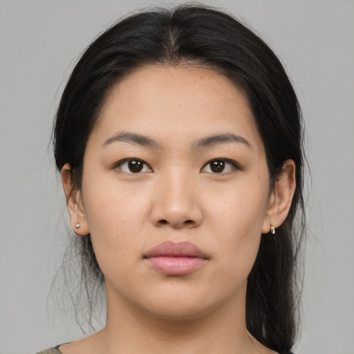 Joyful asian young-adult female with medium  black hair and brown eyes