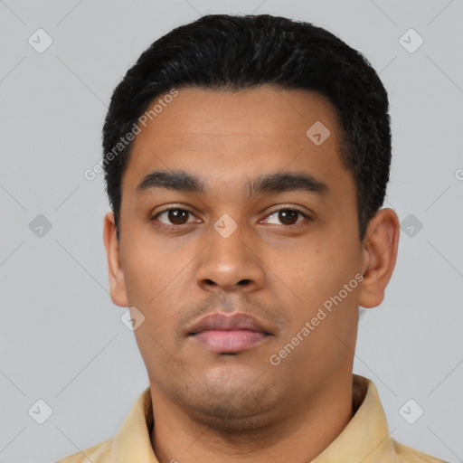 Neutral latino young-adult male with short  black hair and brown eyes