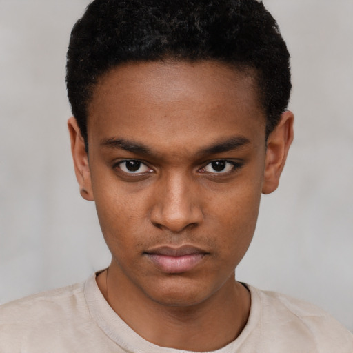 Neutral black young-adult male with short  black hair and brown eyes