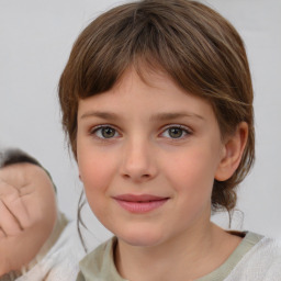 Joyful white child female with medium  brown hair and blue eyes