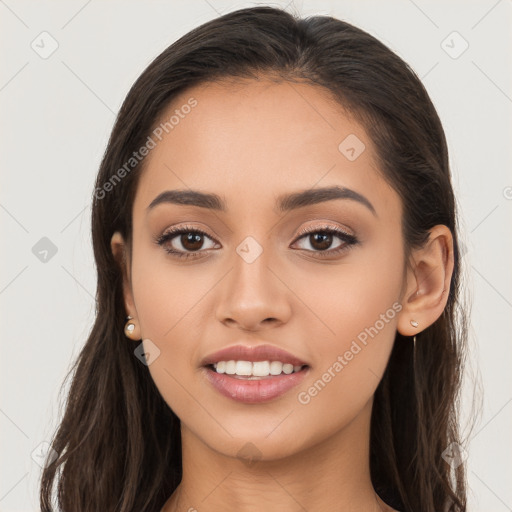 Joyful white young-adult female with long  brown hair and brown eyes