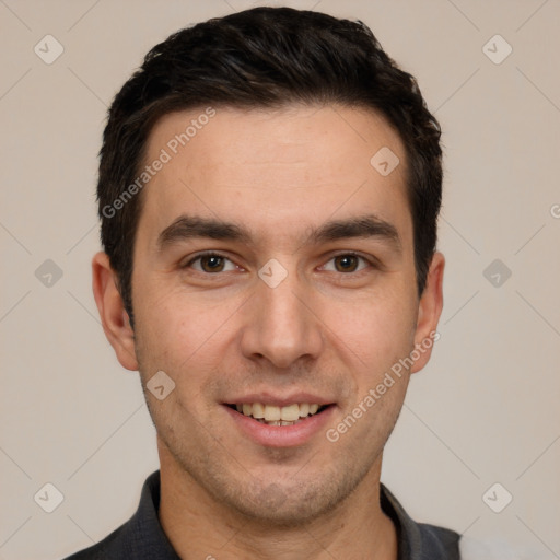 Joyful white young-adult male with short  black hair and brown eyes