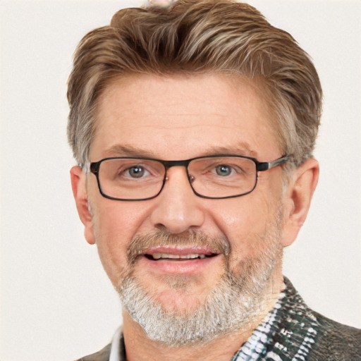 Joyful white middle-aged male with short  gray hair and blue eyes