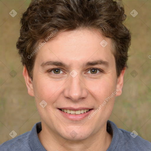 Joyful white adult male with short  brown hair and grey eyes