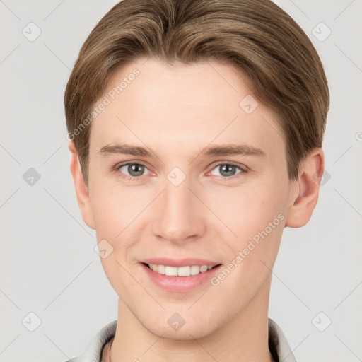 Joyful white young-adult female with short  brown hair and grey eyes