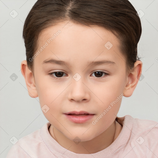 Joyful white child female with short  brown hair and brown eyes