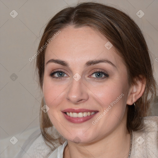 Joyful white young-adult female with medium  brown hair and blue eyes