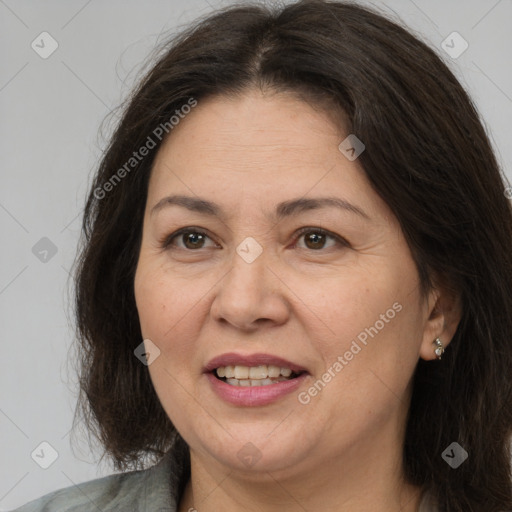 Joyful white adult female with medium  brown hair and brown eyes