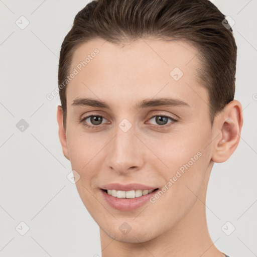 Joyful white young-adult female with short  brown hair and brown eyes