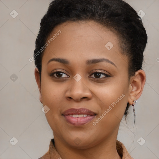 Joyful black young-adult female with short  brown hair and brown eyes