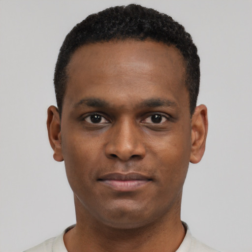 Neutral black young-adult male with short  brown hair and brown eyes