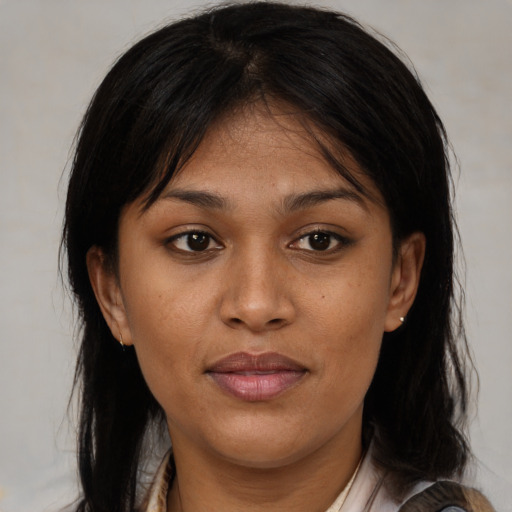 Joyful asian young-adult female with medium  brown hair and brown eyes